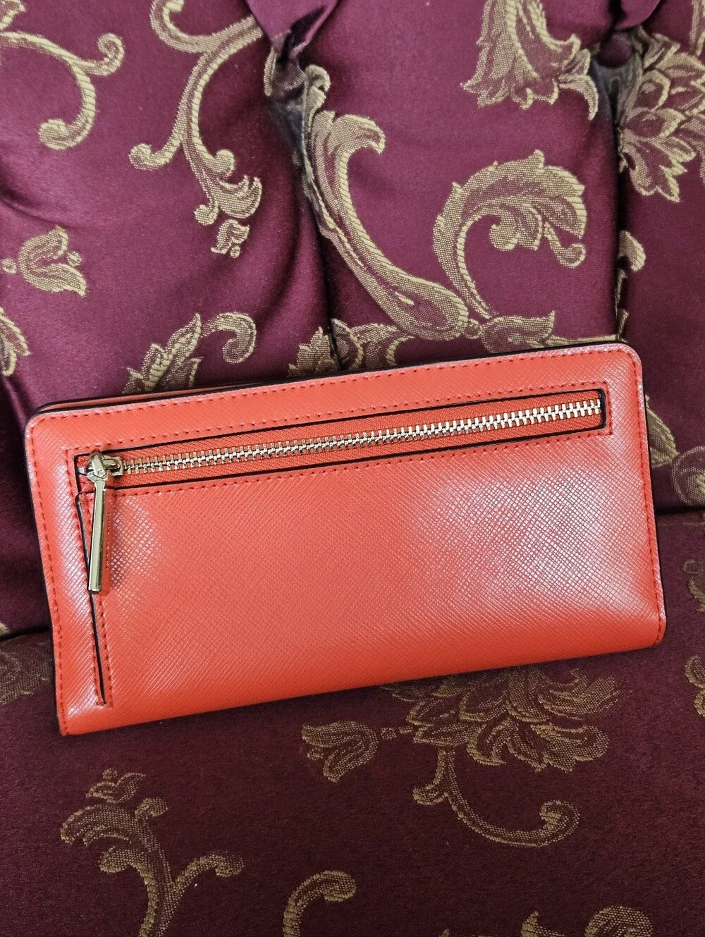 Kate Spade New York coral orange Saffiano leather continental wallet